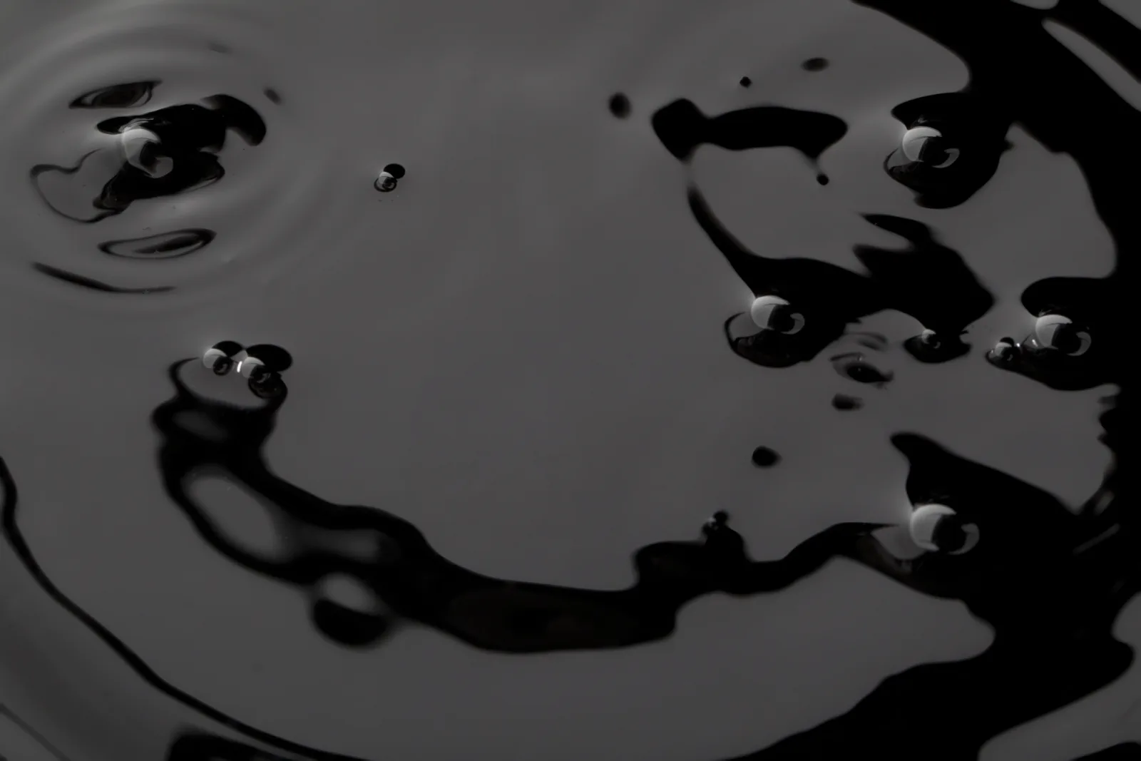 Wet battery-material feed — dark precursor slurry before drying