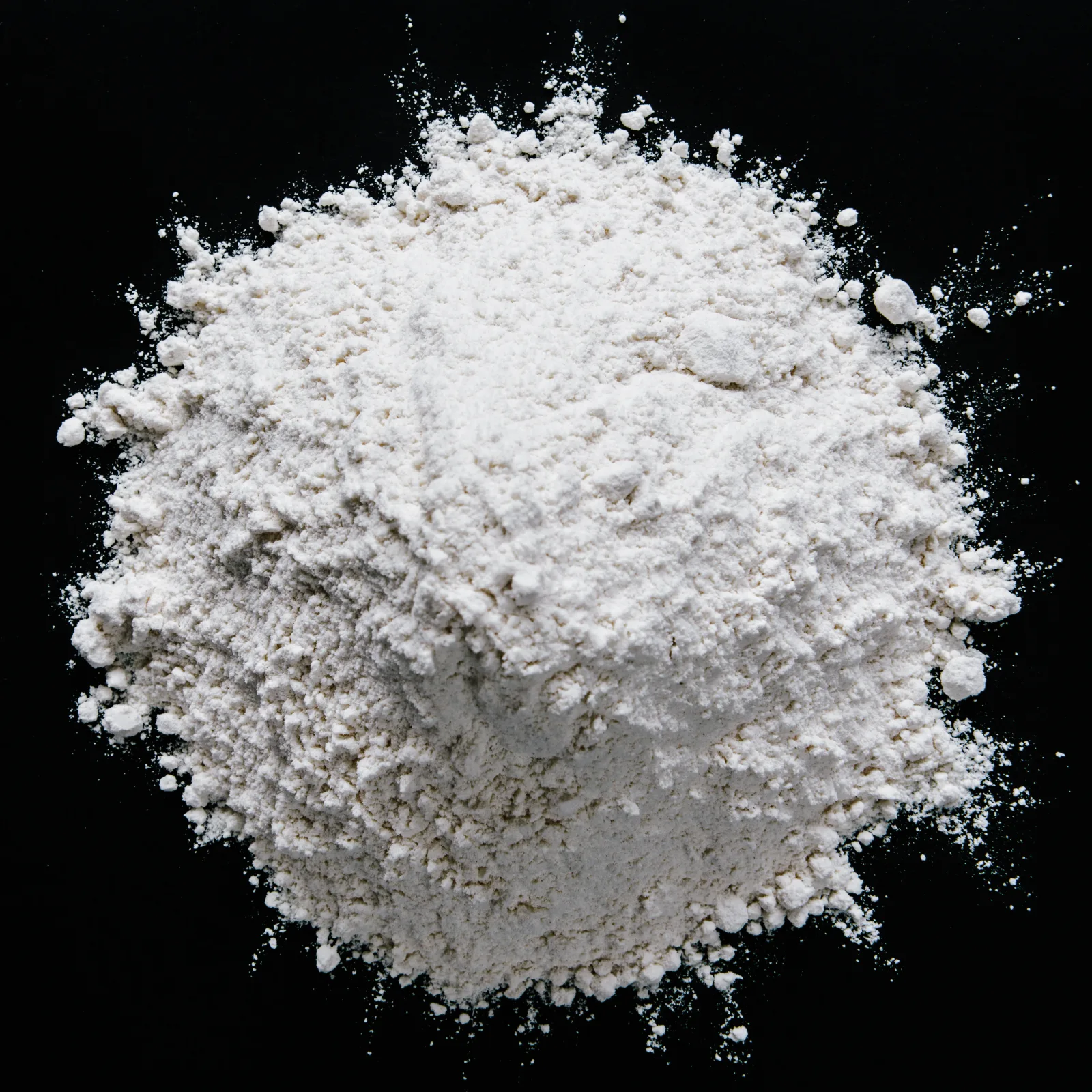 Battery-grade lithium salt powder, top view — fine white crystalline solid