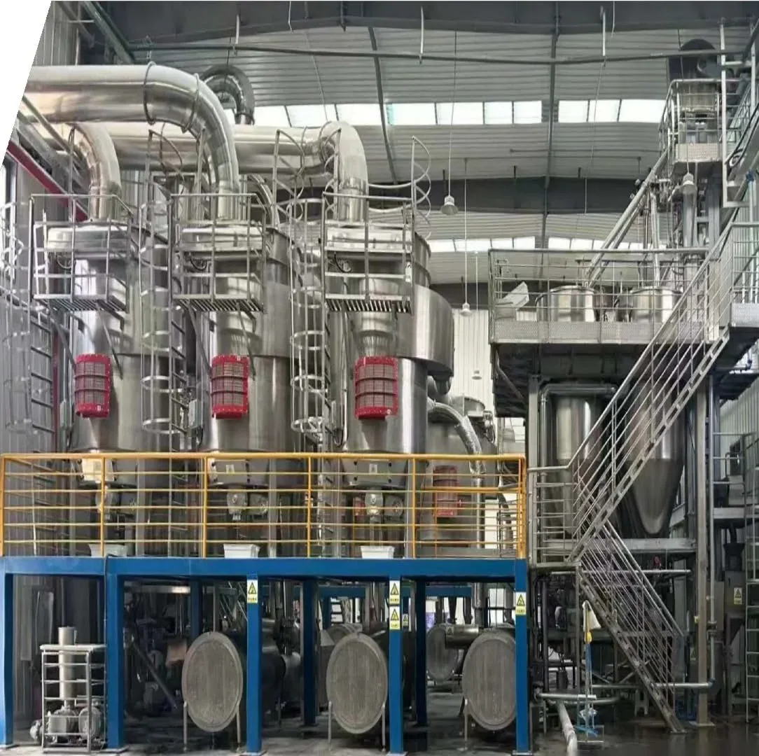 Flexible crushing production line: stainless steel process vessels, access platforms and ducting inside a food-grade workshop.