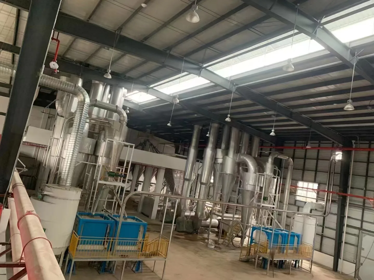 Grain milling workshop with stainless cyclone separators and drying system