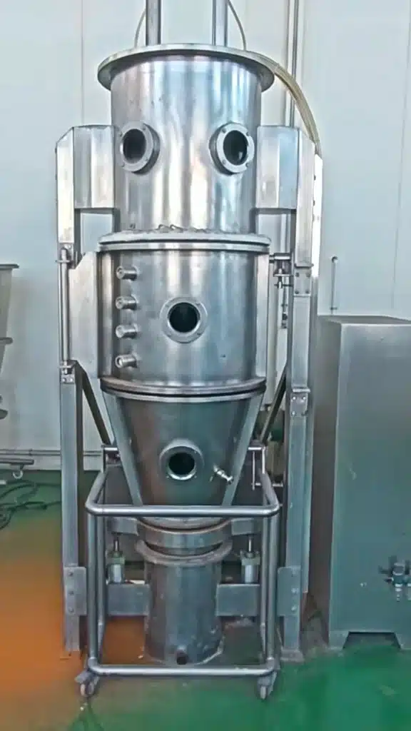 FG vertical fluidized bed dryer fluidizing wet sugar granules in hot air for fast uniform moisture removal
